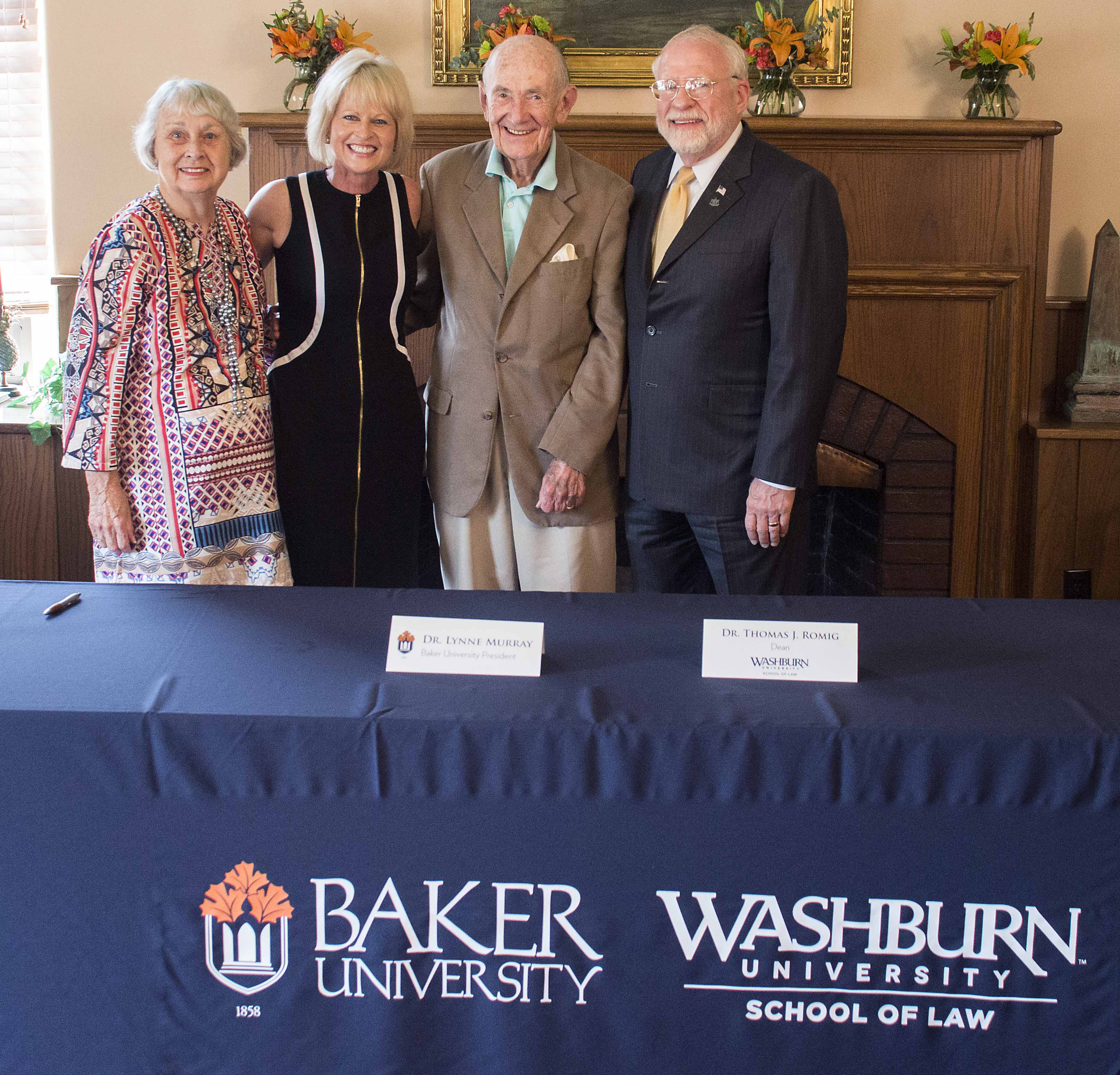 Photograph: The Buntens with Dean Romig and President Murray 