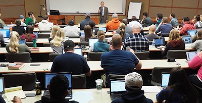 Photograph: Mark Masters lecturing in Decedents' Estates class at Washburn University School of Law.