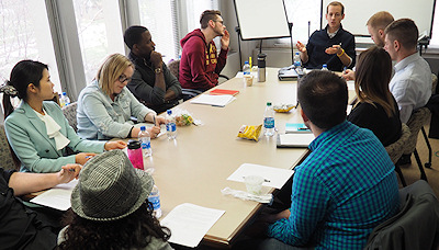 Photograph: Joshua Mortensen discussing non-disclosure agreements with students.