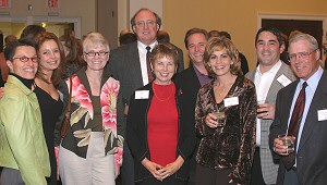 Photograph: Alumni, faculty and friends at a reception hosted by Washburn Law.