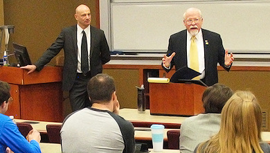 Photograph: Tom Romig and Craig Martin discussing CIA detention and interrogation report.